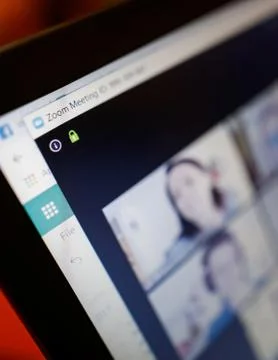 Shallow depth of field image (selective focus) with the Zoom video conference Stock Photos