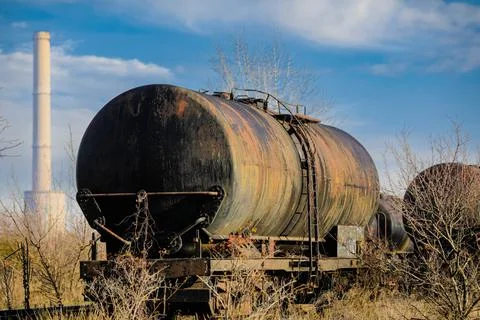 Shallow depth of field (selective focus) image with old and rusty railway oil Stock Photos