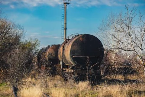 Shallow depth of field (selective focus) image with old and rusty railway oil Stock Photos