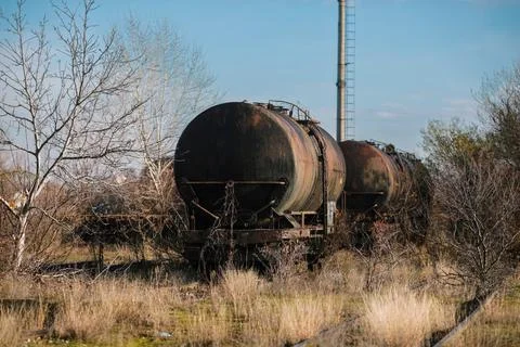 Shallow depth of field (selective focus) image with old and rusty railway oil Stock Photos