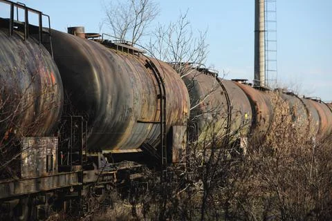 Shallow depth of field (selective focus) image with old and rusty railway oil Stock Photos
