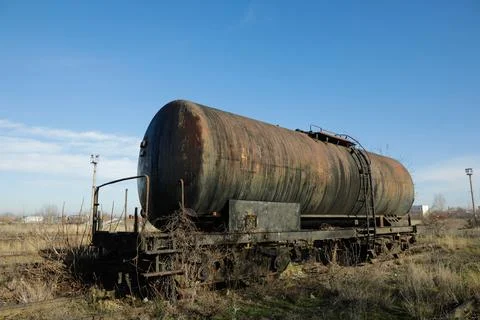 Shallow depth of field (selective focus) image with old and rusty railway oil Stock Photos