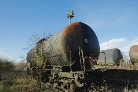 Shallow depth of field (selective focus) image with old and rusty railway oil Stock Photos