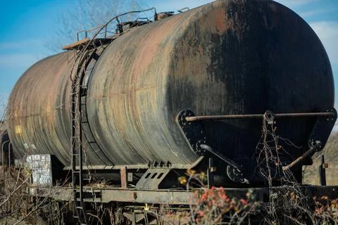 Shallow depth of field (selective focus) image with old and rusty railway oil Stock Photos