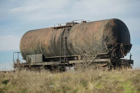 Shallow depth of field (selective focus) image with old and rusty railway oil Stock Photos