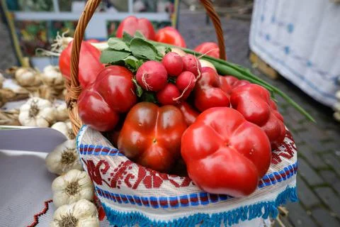 Shallow depth of field (selective focus) image with a basket filled with orga Stock Photos