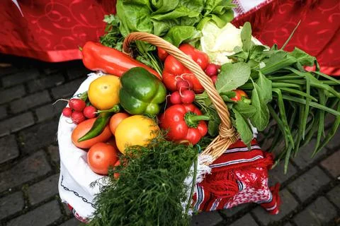 Shallow depth of field (selective focus) image with a basket filled with orga Stock Photos