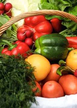 Shallow depth of field (selective focus) image with a basket filled with orga Stock Photos
