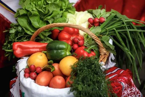 Shallow depth of field (selective focus) image with a basket filled with orga Stock Photos