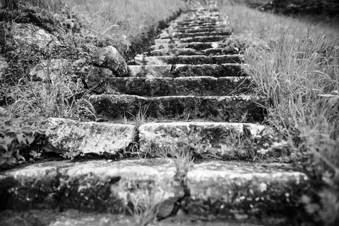 Shallow depth of field (selective focus) image with medieval stone steps fr.. Stock Photos
