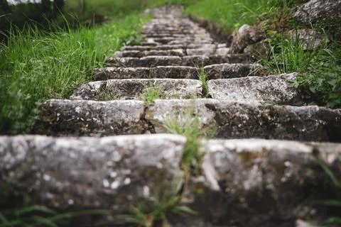 Shallow depth of field (selective focus) image with medieval stone steps fr.. Stock Photos