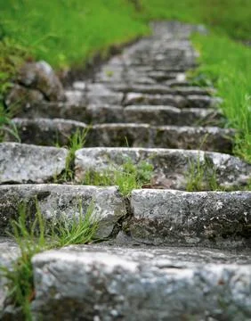 Shallow depth of field (selective focus) image with medieval stone steps fr.. Stock Photos