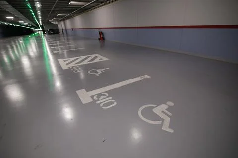 Shallow depth of field (selective focus) image with parking lots for people.. Foto stock