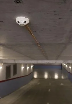 Shallow depth of field (selective focus) image with a smoke detector sensor.. Foto stock