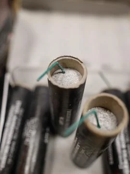 Shallow depth of field (selective focus) details with dangerous firecracker.. Stock Photos