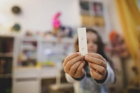 Shallow depth of field (selective focus) details with the hands of a 6 year.. Stock Photos
