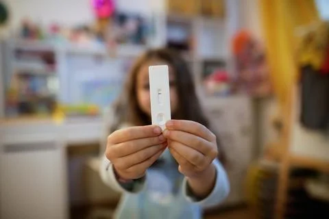 Shallow depth of field (selective focus) details with the hands of a 6 year.. Stock Photos