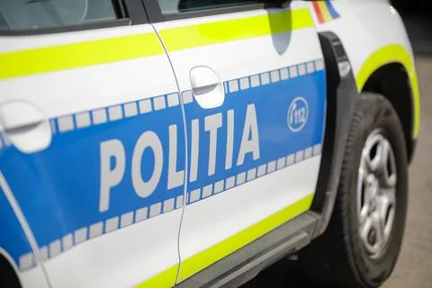 Shallow depth of field (selective focus) image with a Romanian Police car. Stock Photos