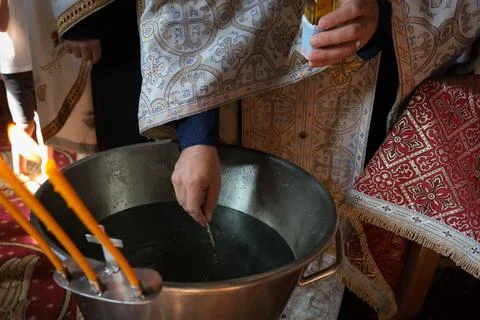 Shallow depth of field (selective focus) details with an orthodox priest in.. Stock Photos