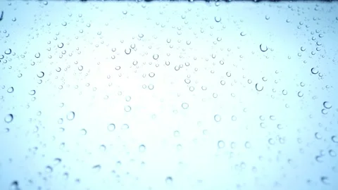 Shallow depth of field shot of Rainwater drops Falling On the Car glass, Rain Stock Footage 137647897