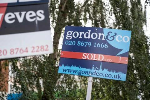 A shallow depth of field shot of two Estate Agents boards in London Stock Photos