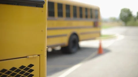 Shallow depth-of-field of yellow school buses parked. Stock Footage 144470270