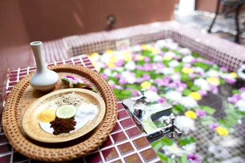 Shallow depth spa massage setting with thai herbal compress stamps Stock Photos