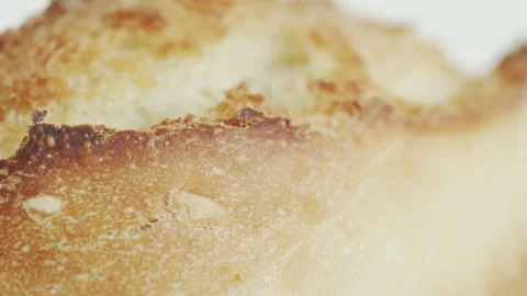 Shallow DOF focus pulling on baked bread 4K video Stock Footage 169654311