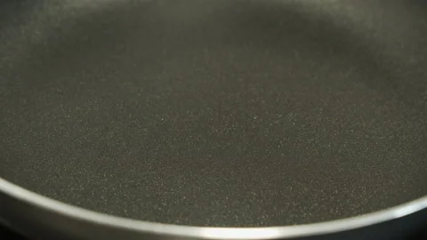 Shallow DOF focus pulling over hot pan 4K video Stock Footage 158341203