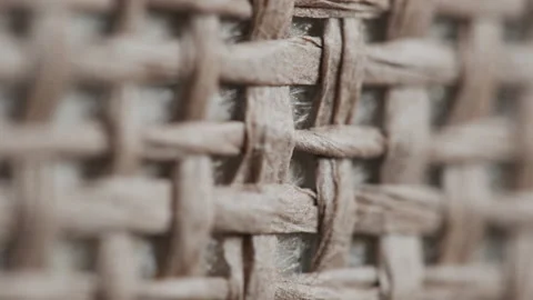 Shallow DOF pulling focus between wicker mesh 4K video Stock Footage 169745068