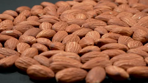 Shallow Focus Backlit Raw Almonds Macro 4K Видео 332845327