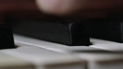 Shallow focus close up shot of hands / fingers playing the piano Stock Footage 65381047