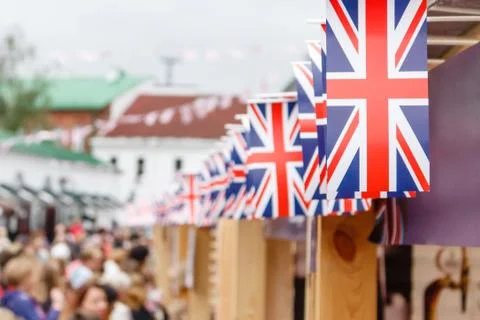 Shallow focus image of a Union Jack flack on a row on flag bunting, above a Stock Photos