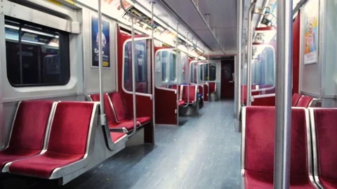 Shallow focus shot of riding an empty subway car late at night Stock Footage 82374438