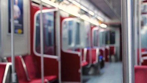 Shallow focus shot of the safety bar on an empty subway car Stock Footage 82367319