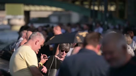 Shallow focus view along The Queue of people waiting to see the Queen lying i Stock Footage 211864122
