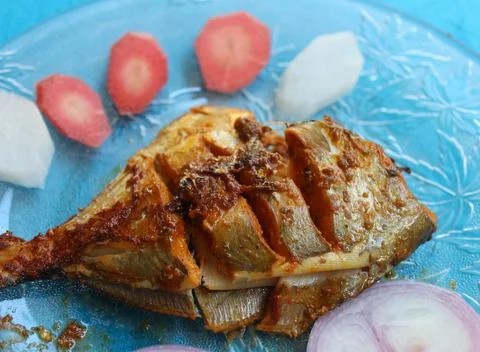 Shallow fried Pomfret fish Stock Photos