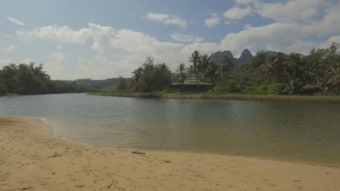 Shallow inlet surrounded with beach and trees Stock Footage 104939132