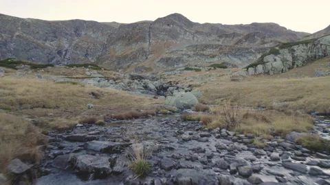 Shallow mountain stream in Rila mountain, Bulgaria Stock Footage 222057720
