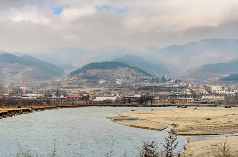 A Shallow River is Flowing Through a Poor Village in Bulgaria, Balkans, Europe Stock Photos