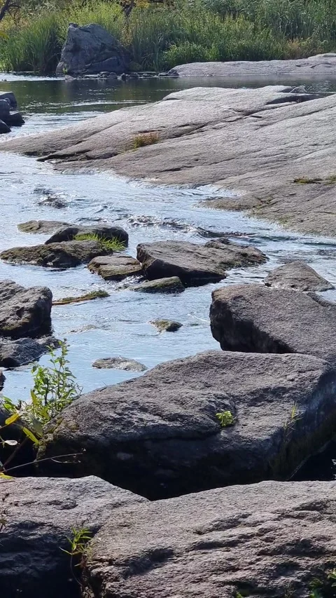 Shallow rocky stream over granite rocks. Stock Footage 331317830