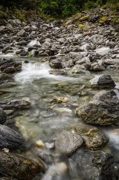 A shallow stream in the wild Stock Photos
