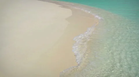 Shallow waves at white sandy beach Stock Footage 1006990
