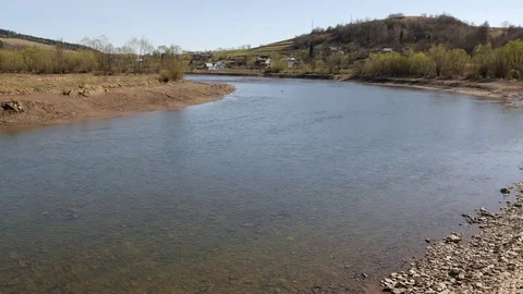 Shallow wide river in the mountains. Stock Footage 75388998