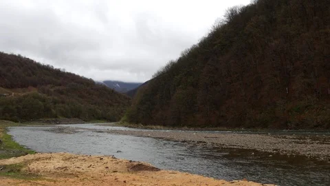 Shallow wide river in the mountains. Stock Footage 75907931