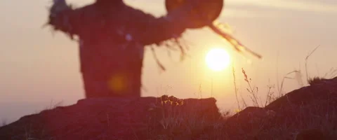 Shaman casts a spell on the sun 5 Stock Footage 50582042