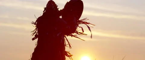 Shaman casts a spell on the sun Stock Footage