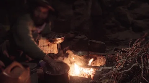 Shaman preparing food Stock Footage 80882543