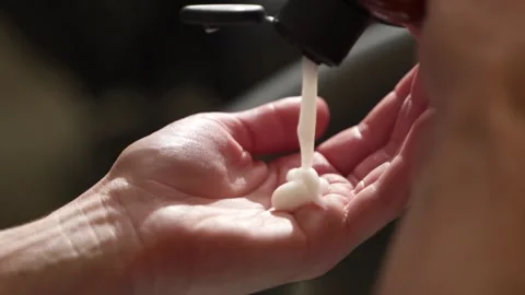 Shampoo is poured into the hand. clear liquid Stock Footage 171862840