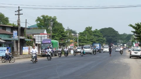 Shan State city, Bycicles and scooters, trafic in Burma, Asia in 4K Stock Footage 94877355